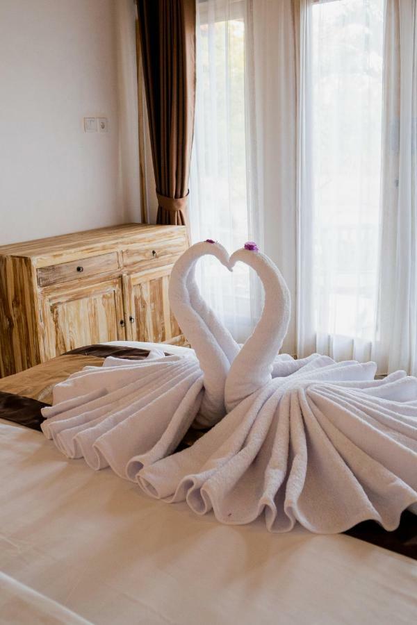 Kayu Kuning Cottage Toyapakeh Εξωτερικό φωτογραφία